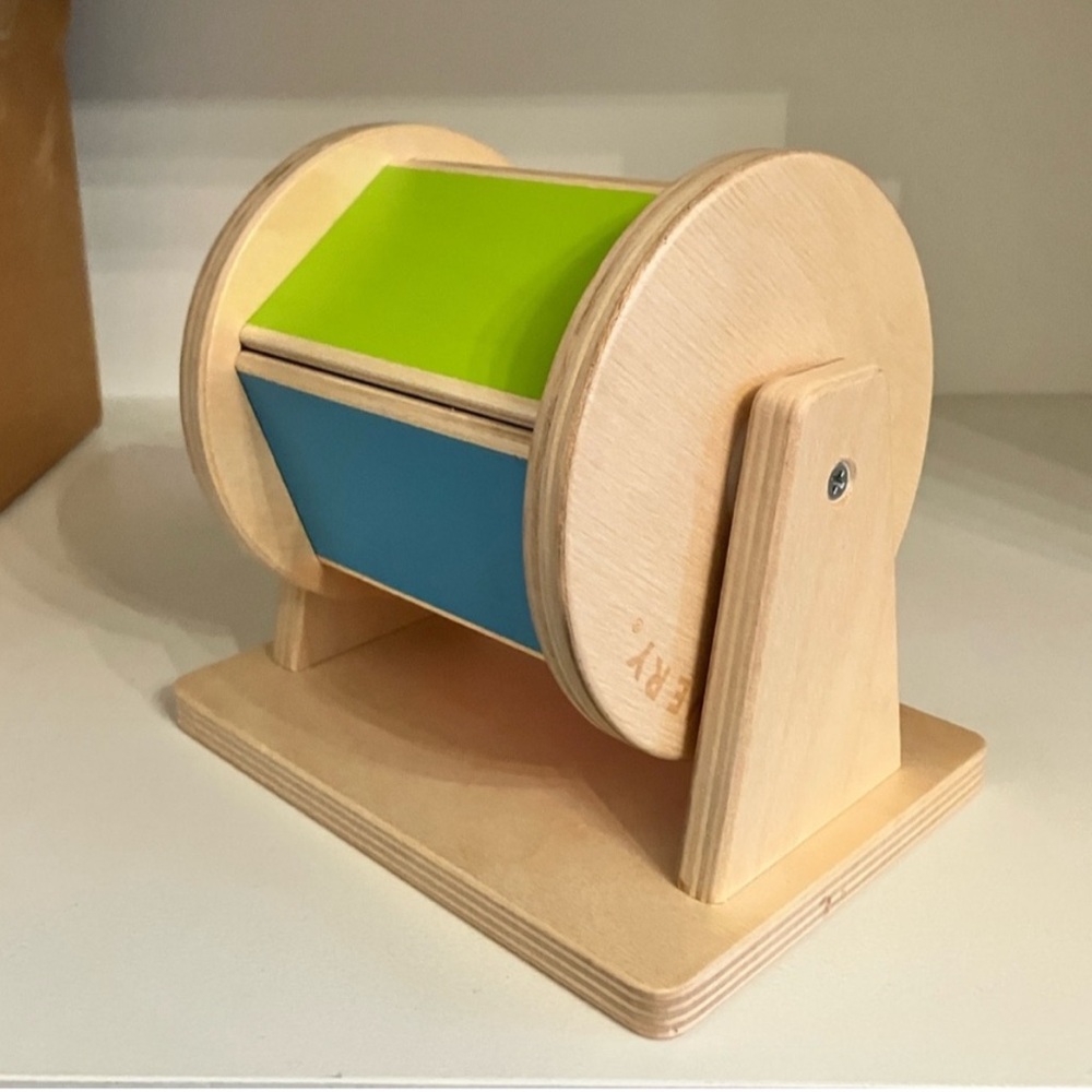 Montessori develop fine/gross motor skills, color,cause/effect.bell